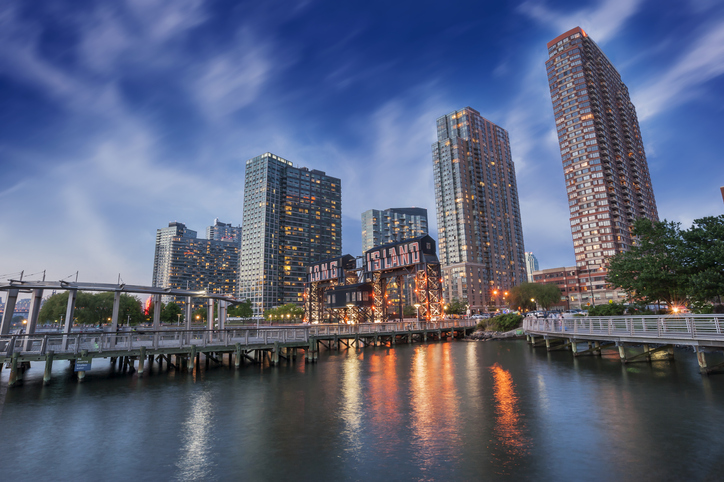 high rise buildings with "Long Island" spelt out on the bridge