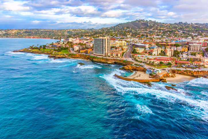 a town of buildings over looking the beach